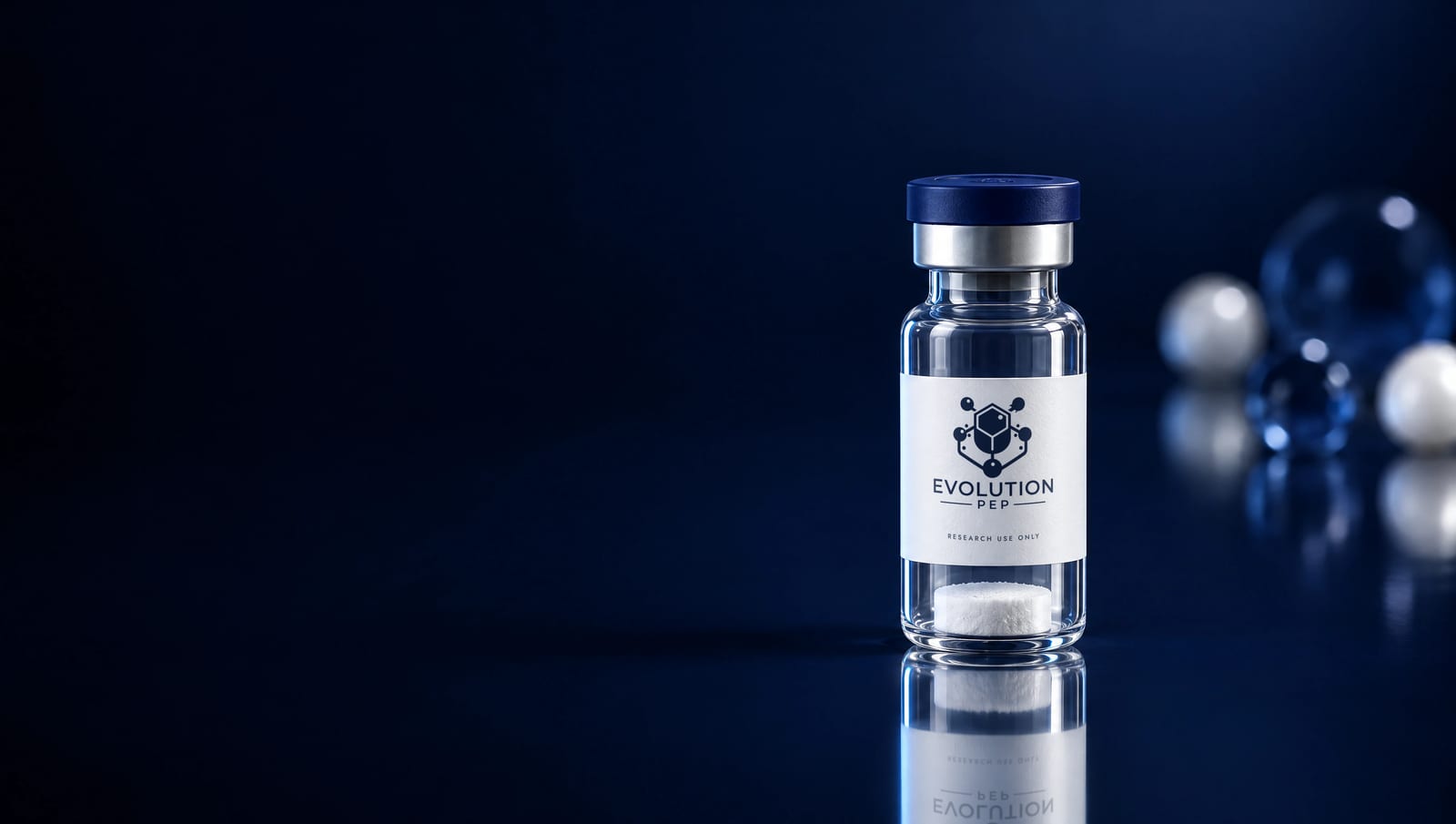 An Evolution Pep vial with a navy cap and silver crimp, beside pearl spheres on midnight glass